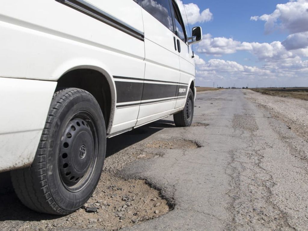 resizepothole-road-kazakhstan-hole-asphalt-wallpaper-preview.jpg.optimal.jpg